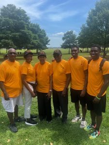 Steph pictured with the Jones men and her parents at the Gatlin Family Reunion NJ, 2023